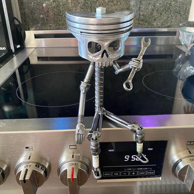 Oddities And Curiosities Piston Skull Sculpture - Art Sculpture Designed Specifically for Car Enthusiasts, Featuring a Gear Base And Handmade Wrench Design. Very Suitable As a Home Or Office Decoration