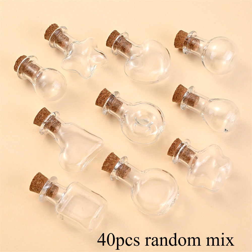40pcs Random Shape Assorted Mini Clear Glass Jar Glass Bottles with Cork Stopper, Small Drift Wishing Bottle, Bead Containers for DIY Ornaments Necklace Projects Wedding Party Christmas New Year Favors