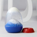 Volcano Liquid Bubbler, Interactive Eggshell Eruption Ornament with Flip-to-Reset Two-Minute Display in Yellow Red or Blue for Home and Desk Decor