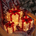 Lighted Christmas Present Boxes, Set of 3 Warm White Gift Decorations with Red Bows, 60 LEDs, USB or Battery Power, 8 Lighting Modes and Daily Timer