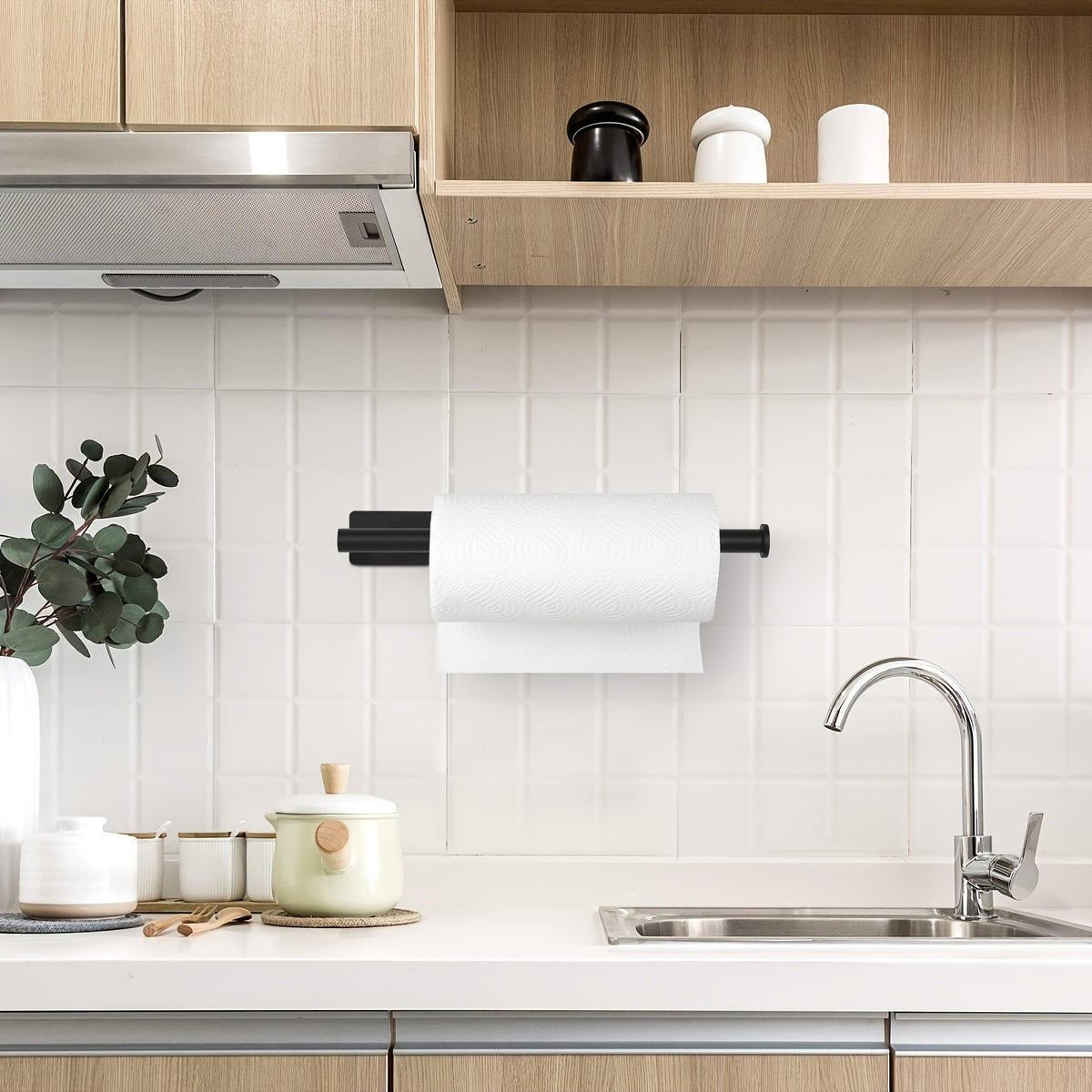 A Single Unit of a Paper Towel Holder Designed for Under Cabinets in The Kitchen, Made from SUS304 Stainless Steel And Can Be Mounted on The Wall Using Either Adhesive Or Screws. It Also Serves As a Rack for Bathroom Towels